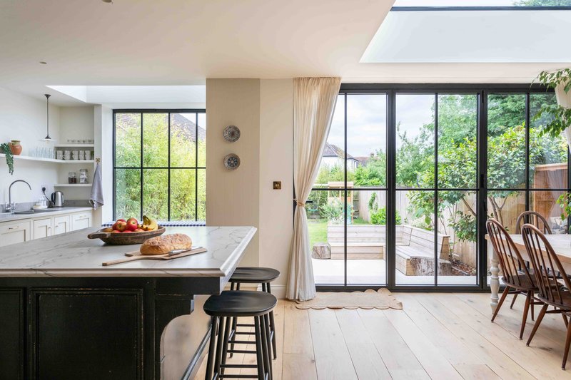 Kitchen diner with large window doors