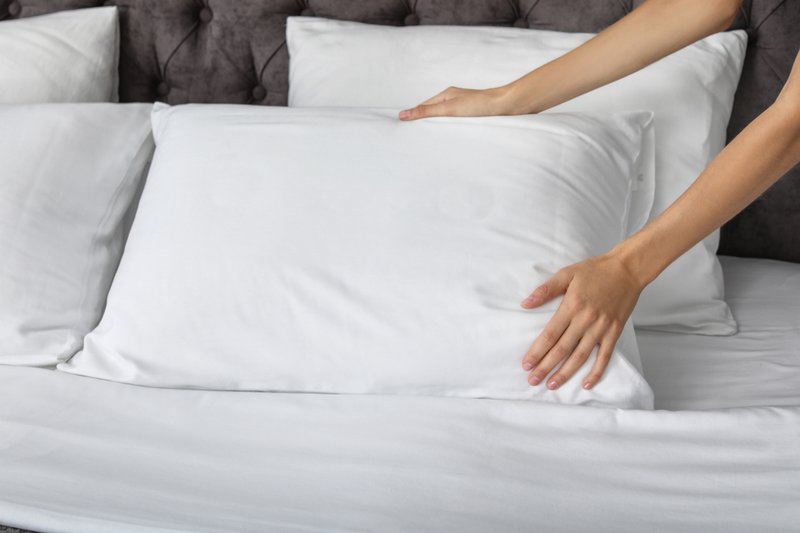 Fluffing a pillow