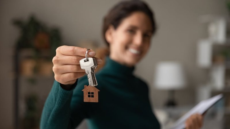 Someone holding house keys
